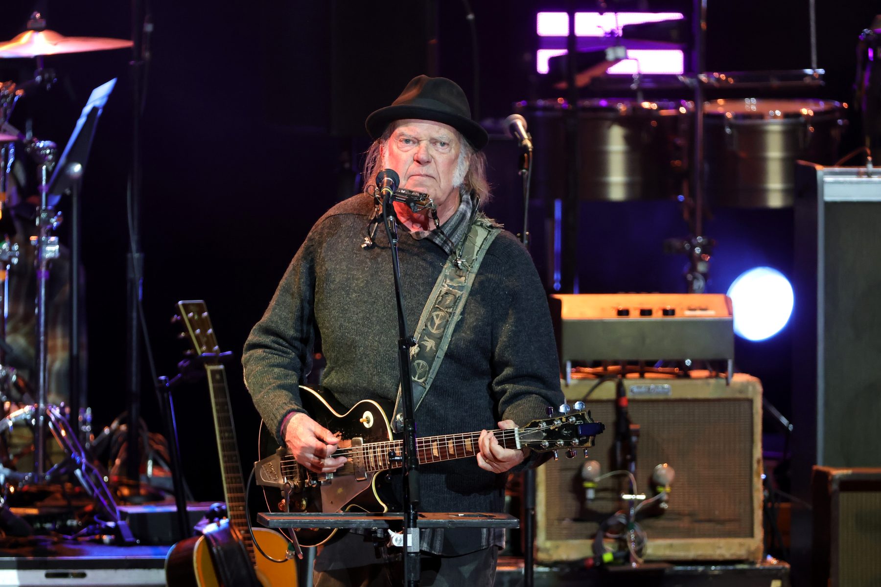 LOS ANGELES, CALIFORNIA - APRIL 26: Neil Young performs onstage during the Light Up The Blues 7 Concert celebrating Autism Speaks' 20th Anniversary at the Greek Theatre on April 26, 2025 in Los Angele